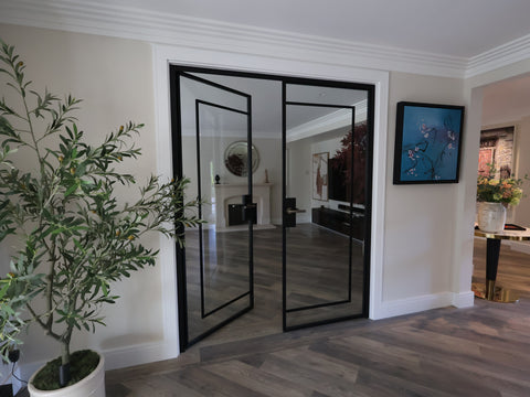 Double steel door finished in black installed in Surrey