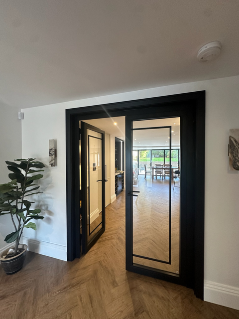 FD30 Steel Double Doors in black steel with slim sightlines