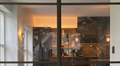 Modern interior with glass door showing dirty glass that needs cleaning